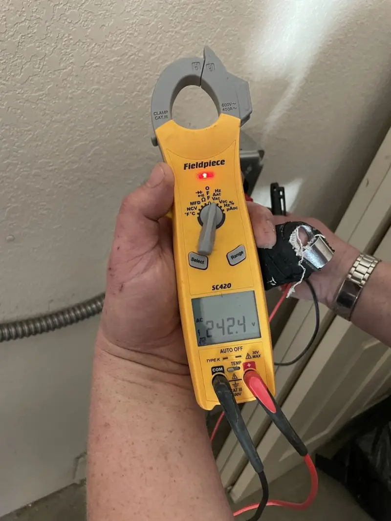 Voltage testing with clamp meter during Generator Installation in Tuscaloosa